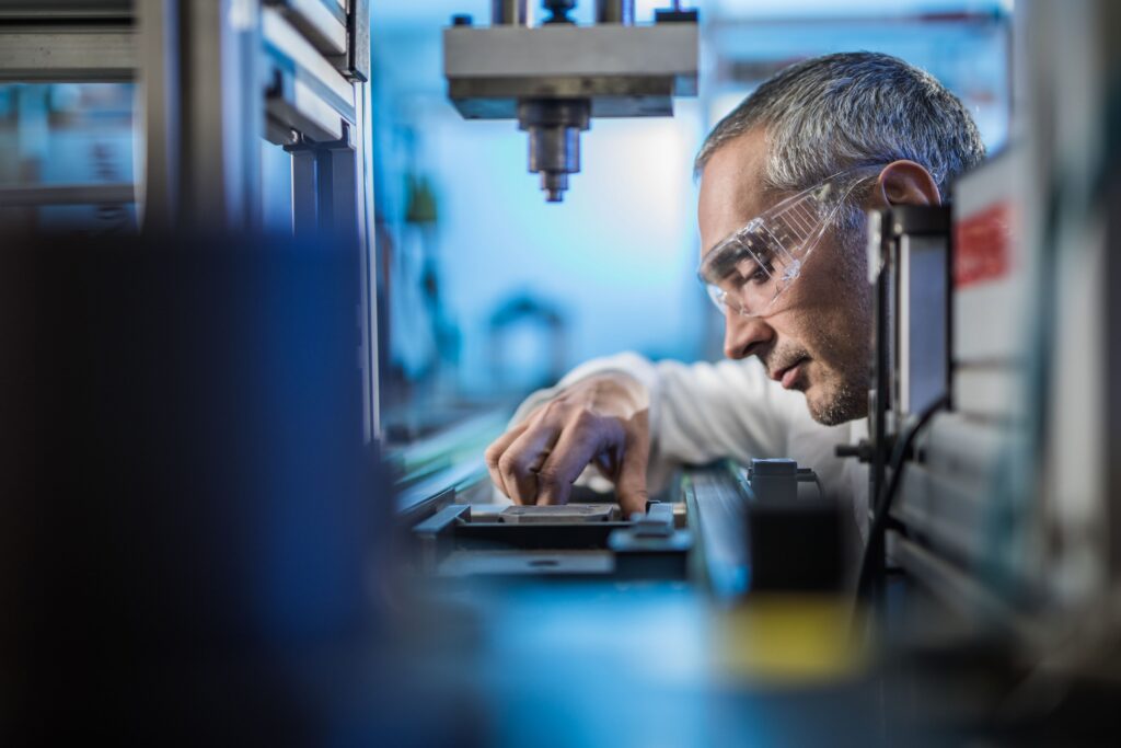 laboratory technician working in a lab performing HASS and HALT testing