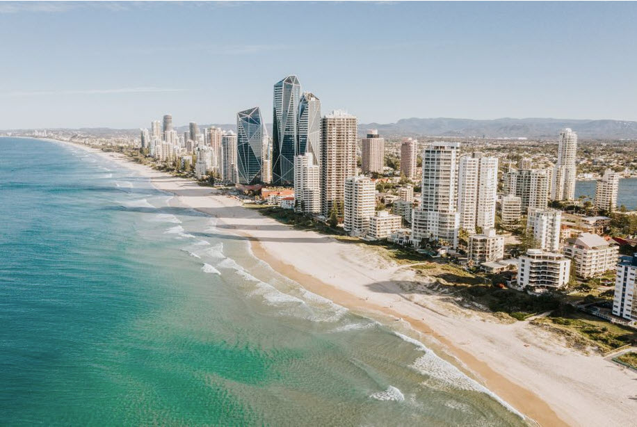 ariel view of sandy beach with hotels and condominiums
