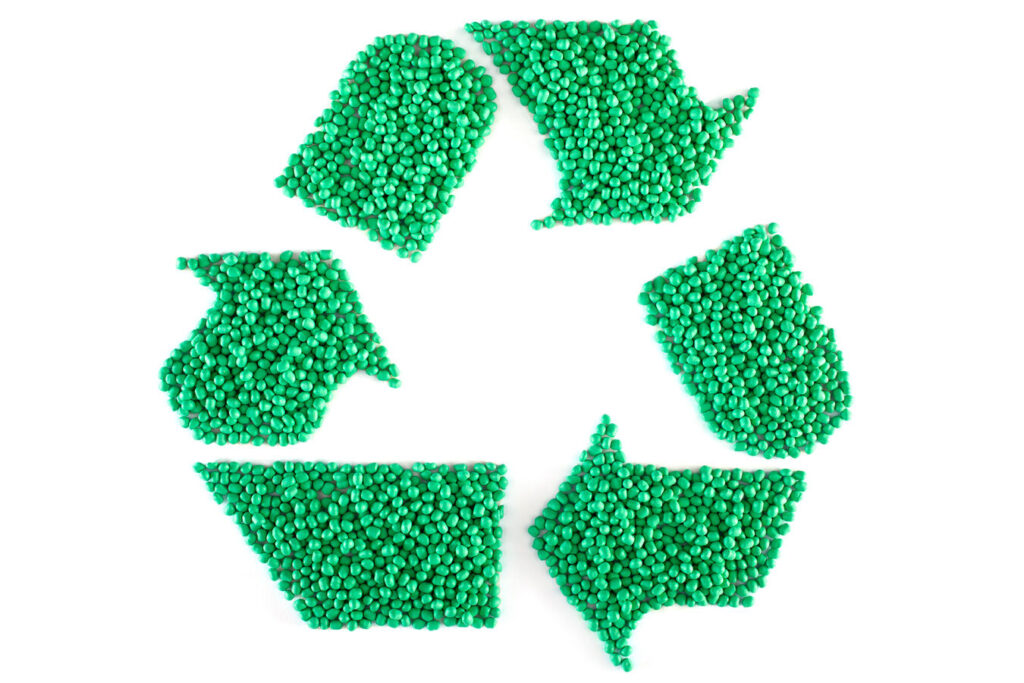 Green recycle symbol on white background