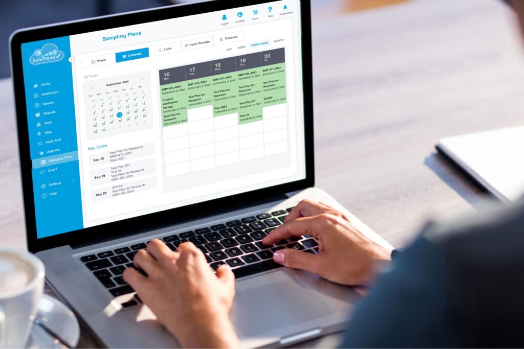 Person using the sampling plan module on a laptop