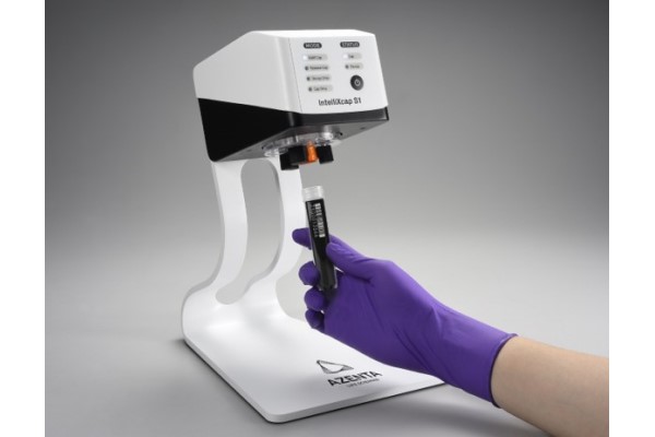 The IntelliXcap S1 Tube capper on a grey background