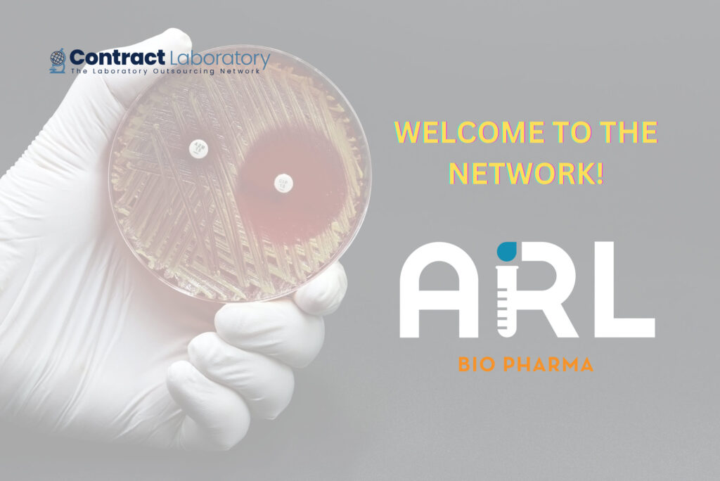 ARL Bio Pharma logo on a background of a gloved hand holding a culture plate with microbial growth and two antibiotic discs.