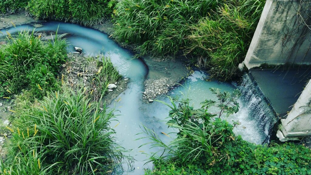 Polluted wastewater flowing in streams and water systems