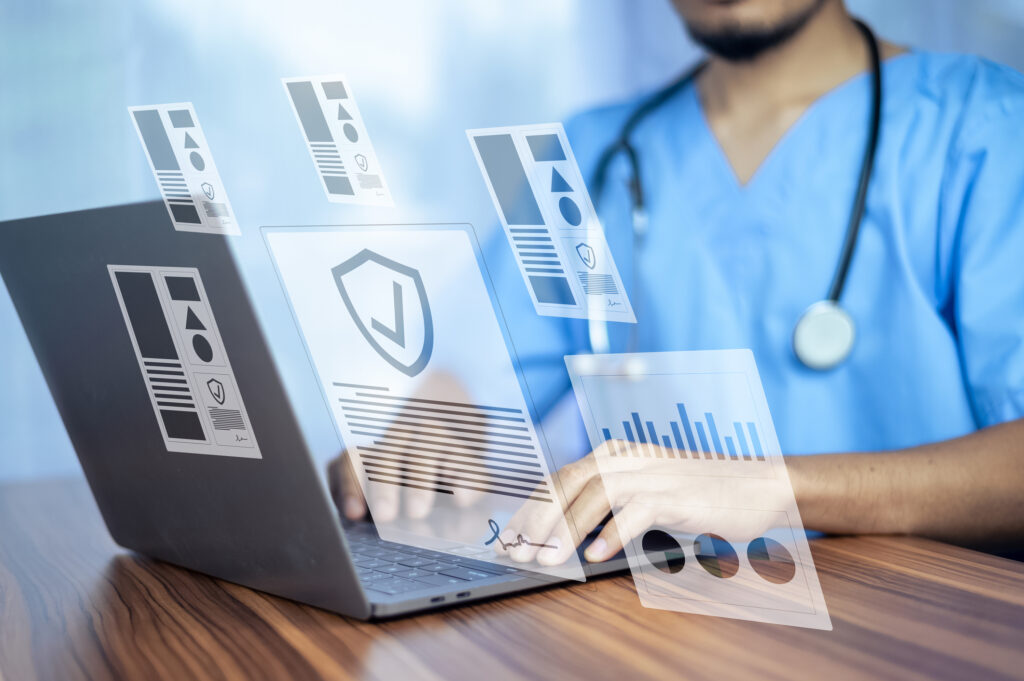 Doctor using LIMS via a laptop