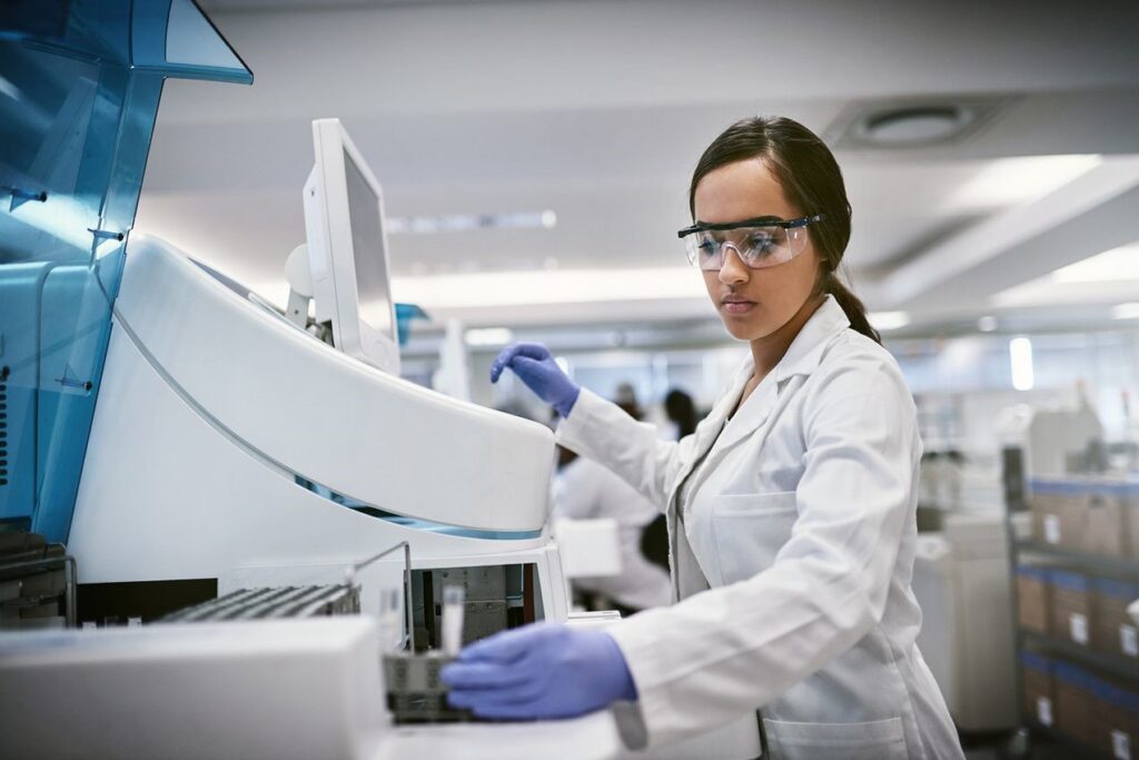 inage of woman working in a laboratory focued on laboratory developed tests