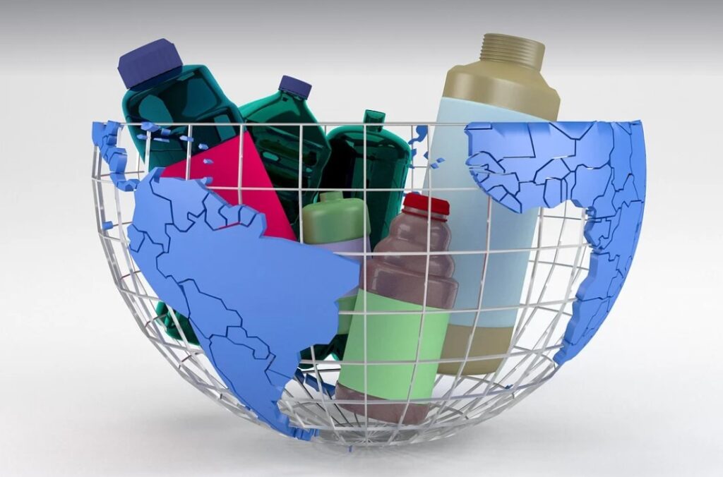 image of different plastics in a wire basket in the shape of the Earth. The image suggests the significance of understanding plastic recycling numbers for recycling