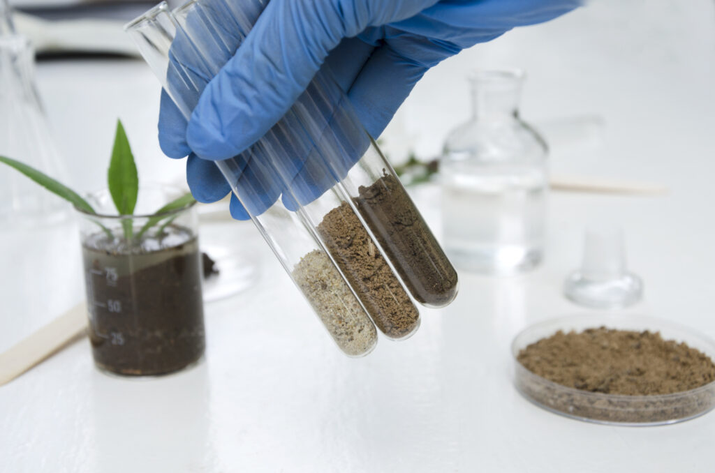 differnt soil types in test tubes illustrating the importance of soli and fertility testing in agriculture