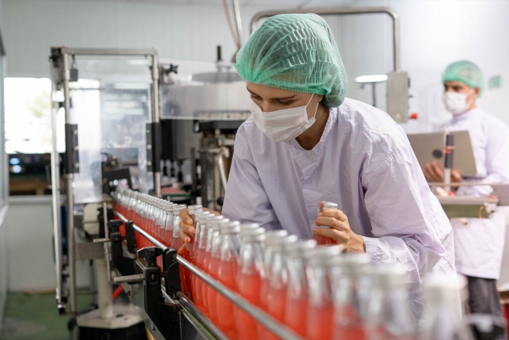 image of a female FDA inspector validating sterilty testing in a manufacturing environment
